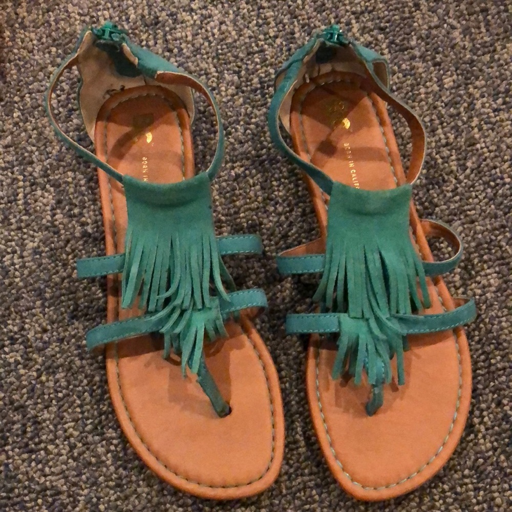 Beautiful turquoise fringe sandals.